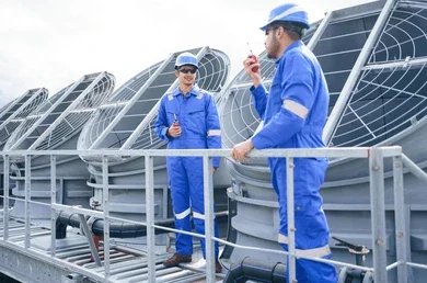 Miami, FL: Technicians inspect commercial Programmable Thermostats. Engineers ensure efficient HVAC systems. Expert thermostat control solutions.